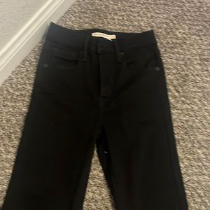 Levi black skinny jeans size 24